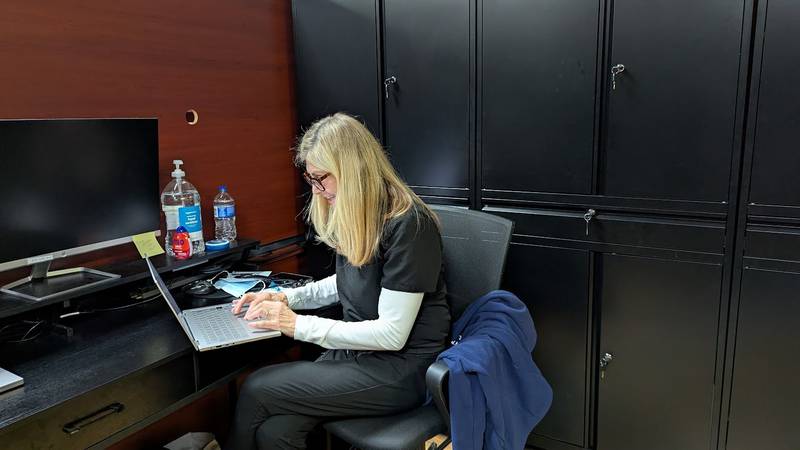 Kathleen Wolz, nurse practitioner at Rapid Healthcare in Joliet, handles administrative duties between seeing patients on Thursday, Feb. 6, 2025.