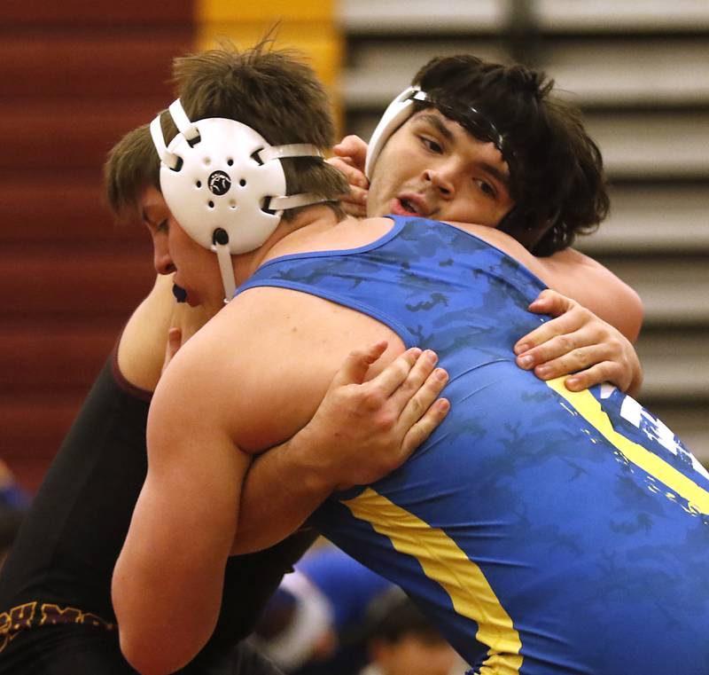 Richmond-Burton's Alex Reyna controls Johnsburg's  during the 190-pound match of a Kishwaukee River Conference wrestling match on Thursday, Jan. 25, 2024, at Richmond-Burton High School.