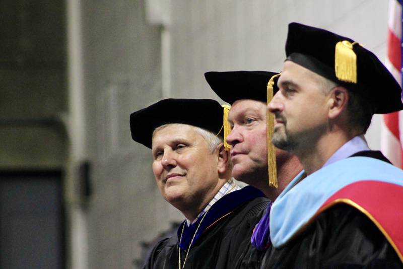 President David Hellmich, Board Board Chairman Robert J. Thompson and Vice President for Academics and Student Services Jon Mandrell are seated on the stage during commencement ceremonies on Friday, May 12 2023 at Sauk Valley Community College.