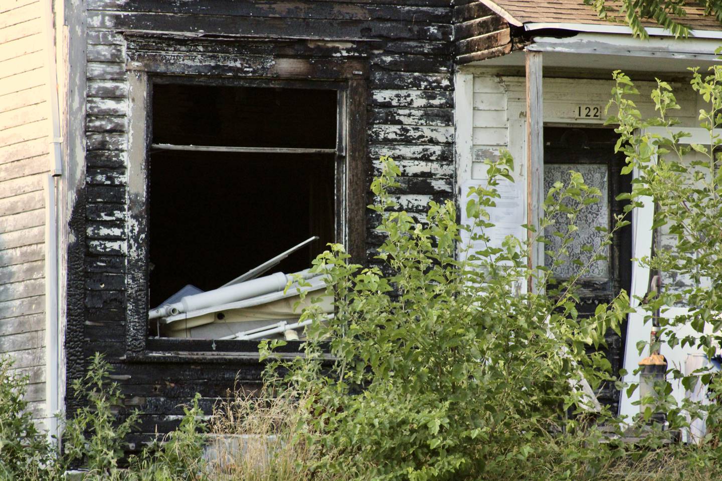 The front entrance to the home at 122 Cherry in Compton that Lee County wants demolished.