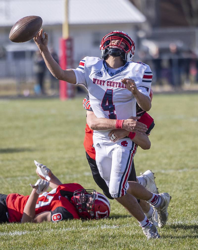 Amboy’s Caiden Heath hammers West Central QB Gage Stimpson Saturday, Nov. 2, 2024, in the 8-man football league first round playoffs.