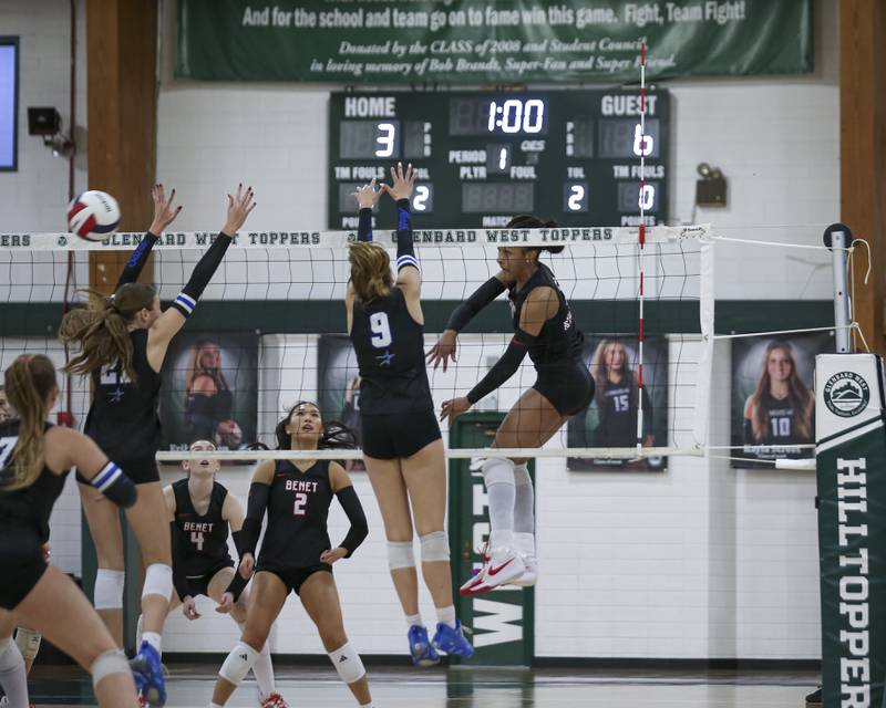 Benet's Brooklynne Brass (5) goes for a kill during Class 4A Glenbard West Sectional final volleyball match between St Charles North at Benet. Nov 6, 2025 in Glen Ellyn.