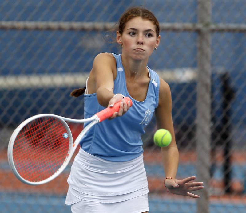 Joliet Catholic’s Ashley Murray returns the ball Thursday, Oct. 19, 2023, during doubles match on the first day of the IHSA State Girls Tennis Tournament at Hoffman Estates High School in Hoffman Estates.