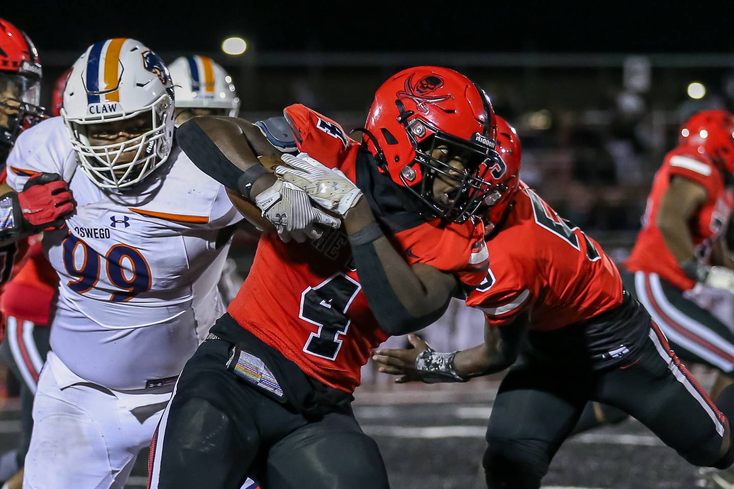 Bolingbrook's Timmie Lewis II (4) runs with the ball during a football game between Oswego at Bolingbrook on Friday, Oct 4th, 2024  in Bolingbrook.