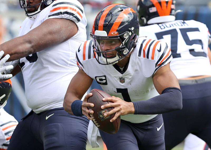 Chicago Bears quarterback Justin Fields scrambles during their game against the Texans Sunday, Sept. 25, 2022, at Soldier Field in Chicago.