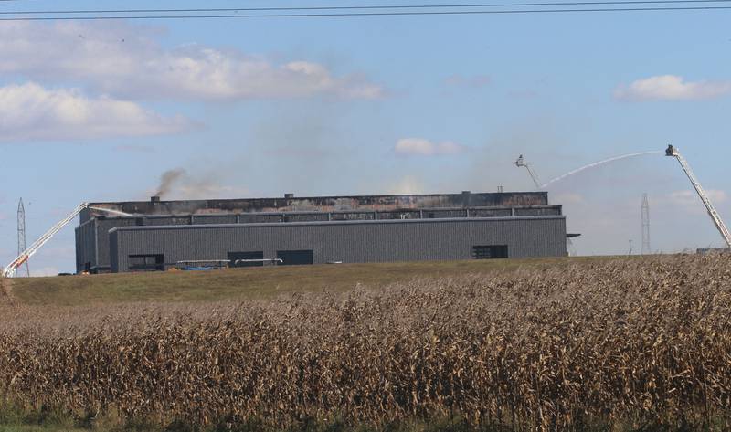 Firefighters work the scene of a structure fire on Wednesday, Oct. 8, 2025 at Marquis Energy in Hennepin. The fire was upgraded to a 5th alarm dispatching the (MABAS) Mutual Aid Box Alarm System. The fire broke out around 11a.m.