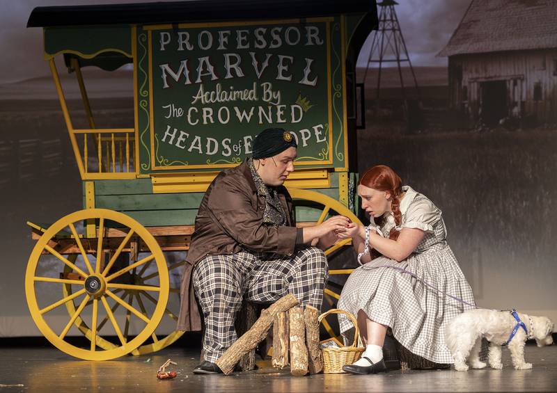 Max Williar, playing Professor Marvel, and Katarina Verdick, playing Dorothy, rehearse a scene Wednesday, April 9, 2025, for Newman High School’s rendition of “The Wizard of Oz.”