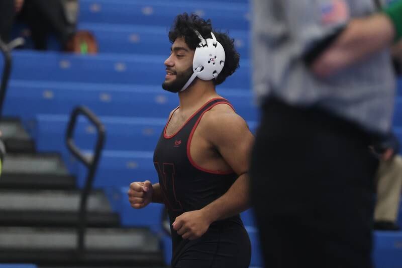 Plainfield North’s Leo Tovar leaves the mat after his forfeit win against Plainfield South in a Southwest Prairie dual meet on Wednesday, Nov. 29, 2023 in Plainfield.