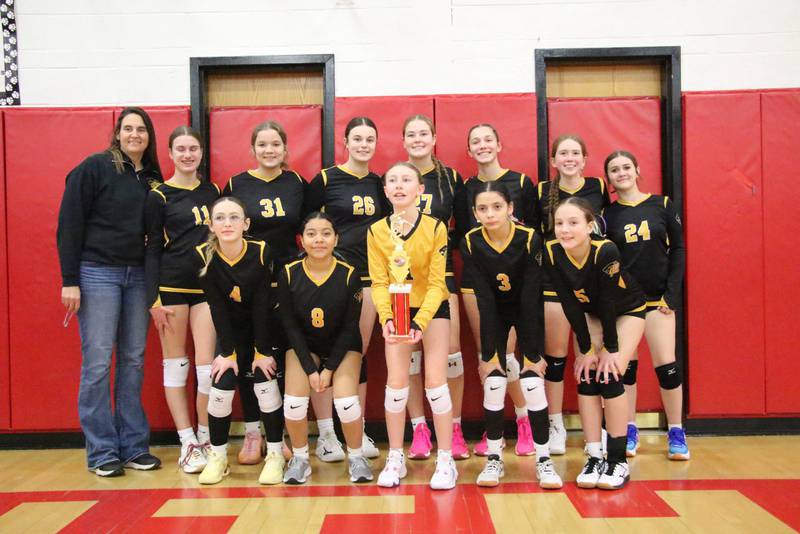 The Putnam County Junior High eighth-grade volleyball team won the Jan Dale Marseilles Tournament. Team members are (front row, from left)  Jaylynn Dickey, Joselyn Lopez, Emmy Carboni, Natalie Gaudiana and Lillian Bouxsein; and back row, Coach Shannon Jenkins, Anna Poignant, Kenzie Pierski, Mcklay Gensini, Tula Rue, Hannah Heiberger, Kami Nauman and Laci Lemke.