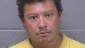 Joliet police officer bit by dog owned by man accused of pointing rifle at neighbors 