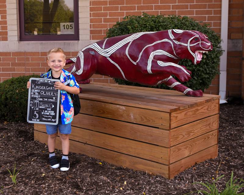Oliver Skrzmowski, 5, is all smiles for a photo before the first day of school on Wednesday Aug. 16, 2023, at Fox Chase Elementary in Oswego.