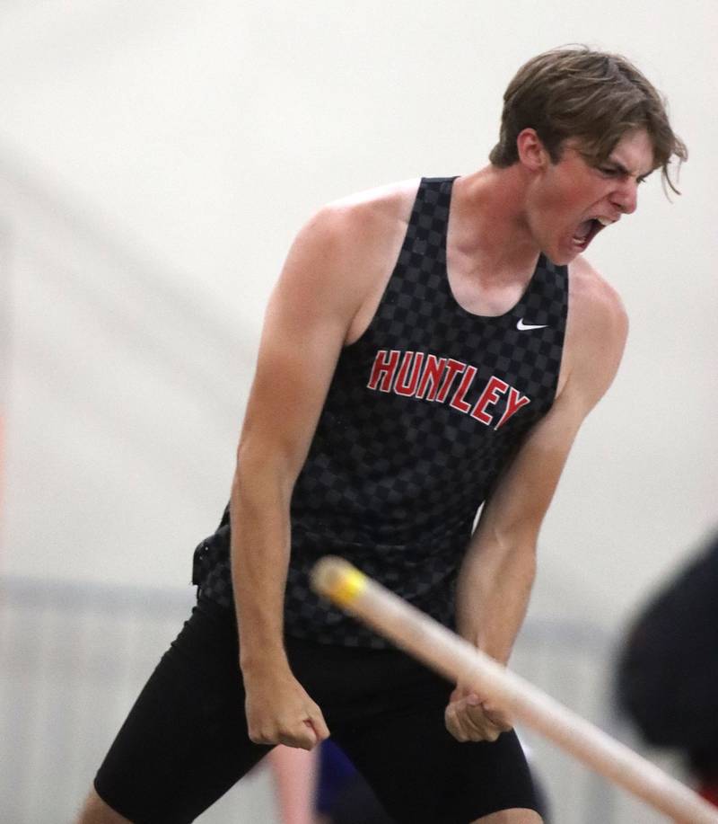 Huntley’s Jake Hill reacts after clearing the bar in the pole vault in Fox Valley Conference boys track and field meet action at Huntley High School in Huntley on Thursday, May 15, 2025.