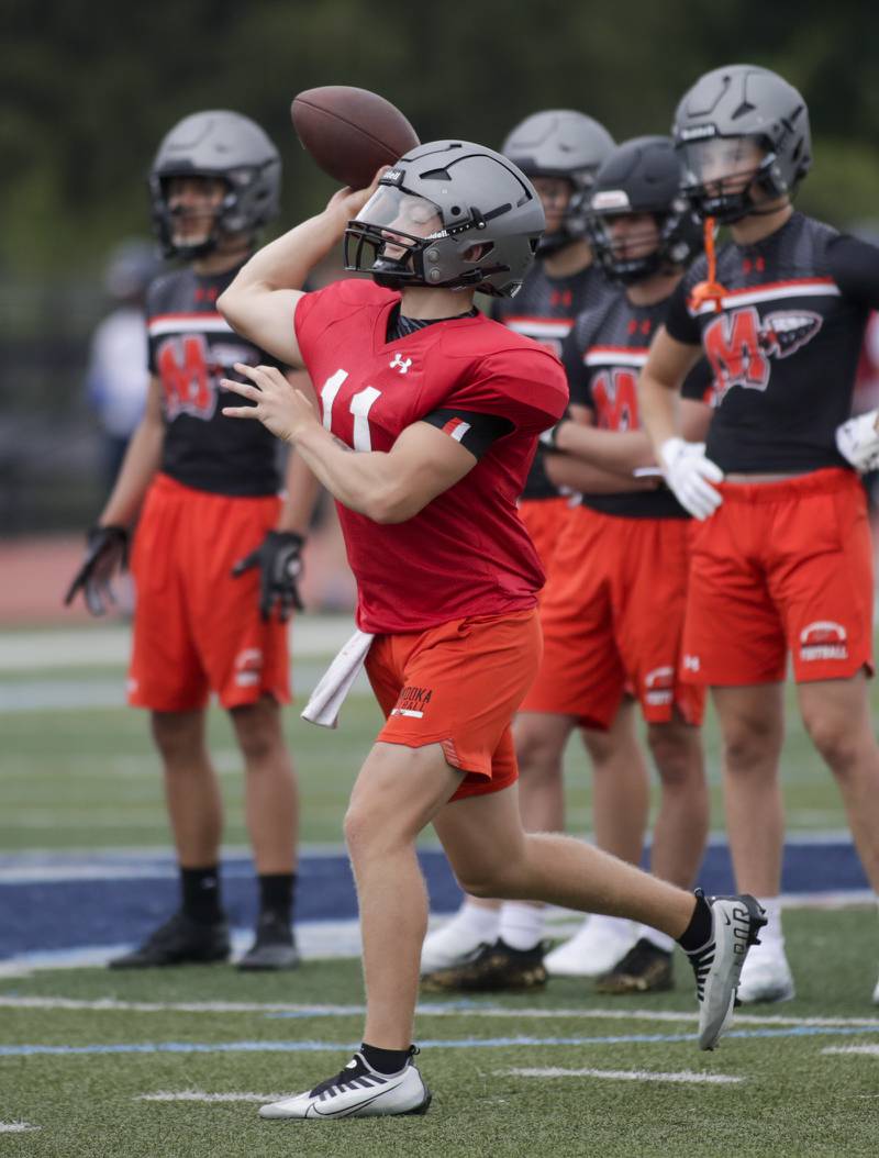 Minooka’s Gavin Dooley passes the ball during the Downers Grove South 7-on-7 in Downers Grove on Saturday, July 16, 2022.