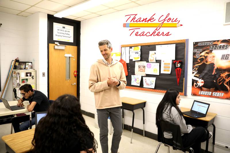 Sandwich High School multilingual teacher Brian Long also coaches track and cross country at the school.