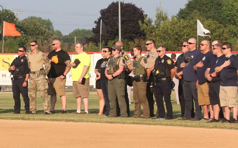 Local first responders are honored during the Illinois Valley Pistol Shrimp baseball game at Schweickert Stadium on Tuesday, June 20, 2023 in Peru.