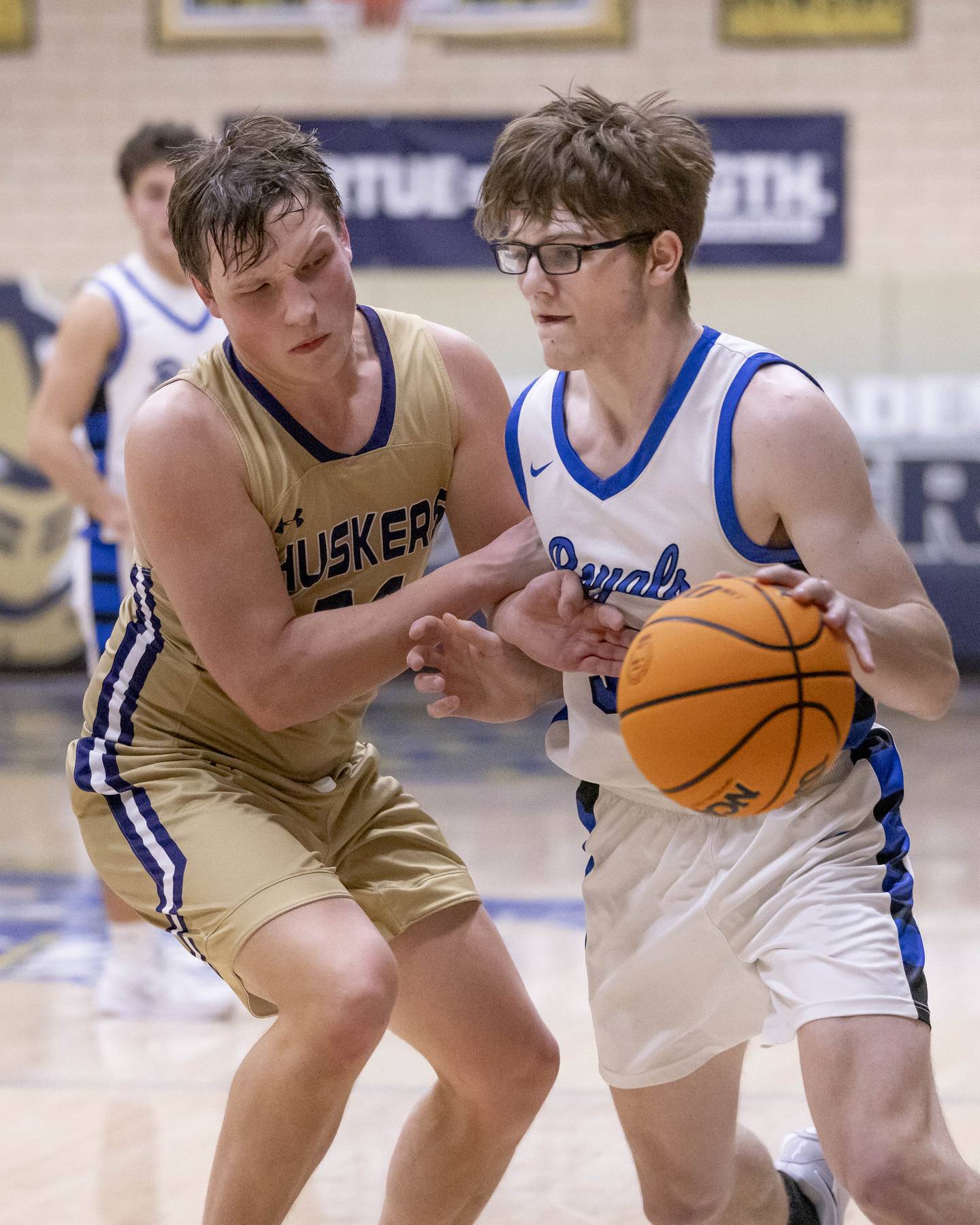 Martin Ledbetter of Hinckley-Big Rock defends the ball against a Serena defender during the Class 1A Regional Championship on February 28, 2025 at Bader Gym.