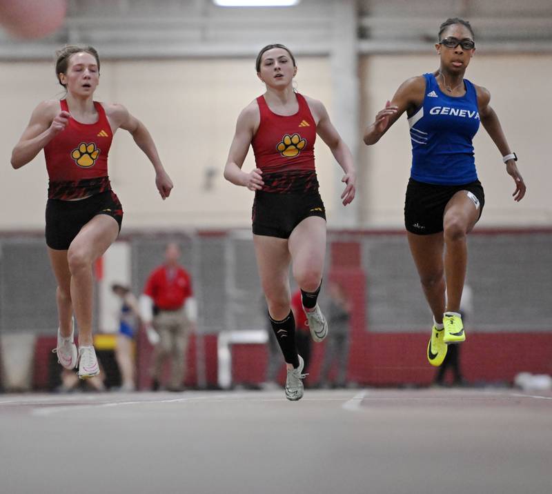 Geneva’s Alyssa Flotte beats Batavia’s Isabelle Taylor and Elizabeth Wende, left, in the 55-meter dash at the Dukane Conference girls indoor track and field meet at Batavia High School on Friday, March 15, 2024.