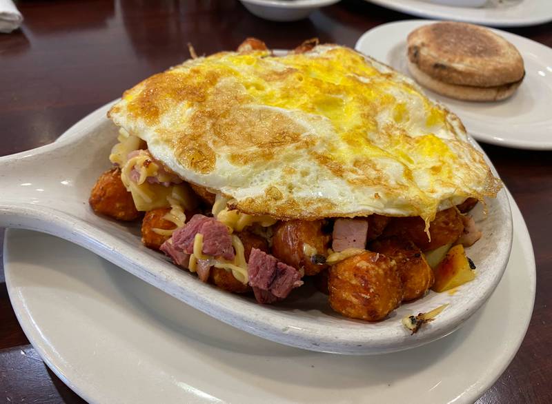 I ordered the sweet potato skillet ($13.50) with an egg over hard on top and an English muffin on the side. The skillet came with sweet potato tots, ham, gouda and apple.