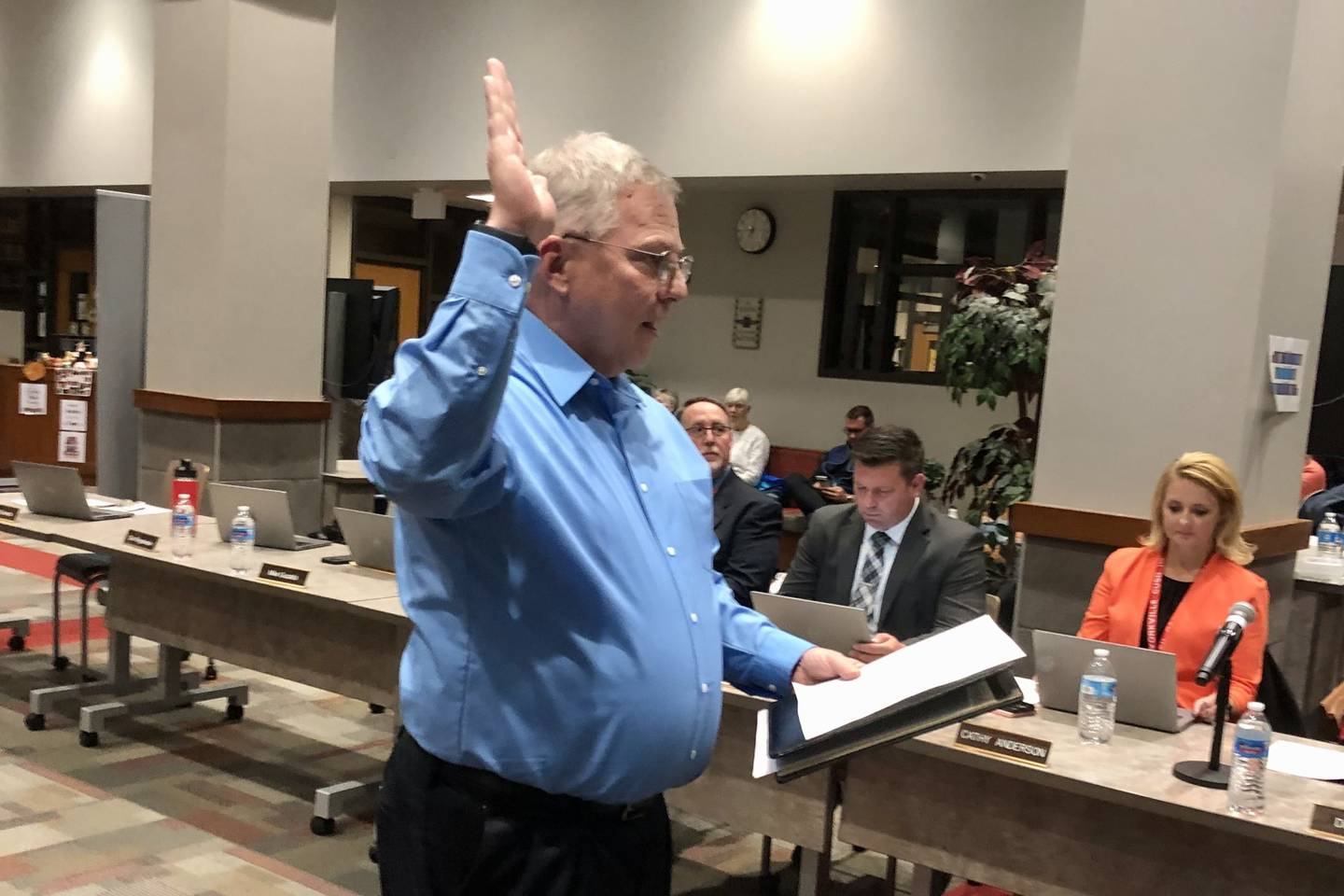 New Yorkville School District 115 board member Wayland Middendorf takes the oath of office at a board meeting on Oct. 30, 2023.