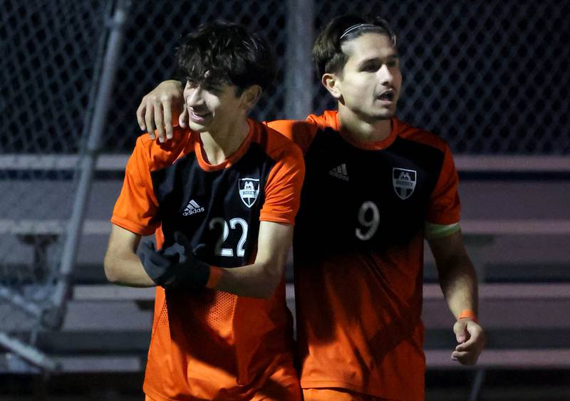 Hersey's Adam Myslinski (left) is congratulated after scoring a goal by teammate Ray Reyes during their game against Hinsdale Central Friday, Nov. 8, 2024, in their Class 3A state semifinal game at Hoffman Estates High School.