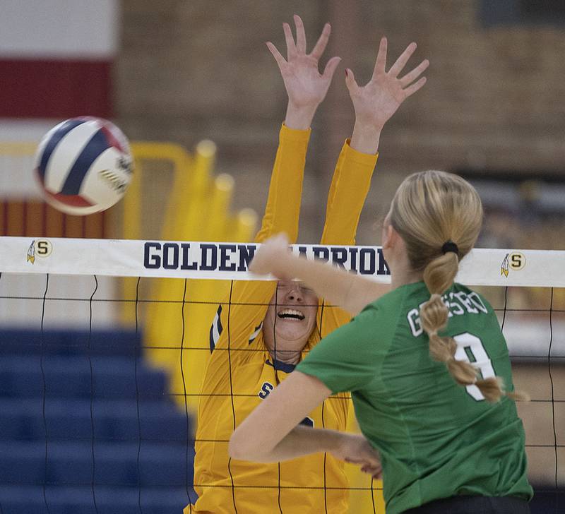Sterling’s Kasey Weeks goes up for a block against Geneseo’s Elli Barickman Tuesday, Sept. 30, 2025.