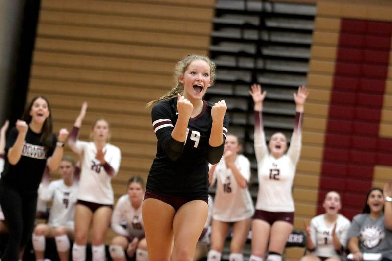 Prairie Ridge’s Tegan Vrbancic and the Wolves celebrate a win in varsity girls volleyball at Huntley High School in Huntley on Thursday, Sept. 11, 2025.