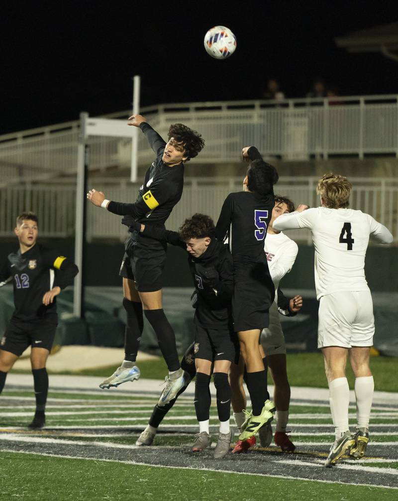 Wauconda's Freddy Barnshaw goes airborne for the ball during the Class 2A Boys Soccer Sectional final on Friday, November 1, 2024 at Grayslake Central High School. Ryan Rayburn for Shaw Local