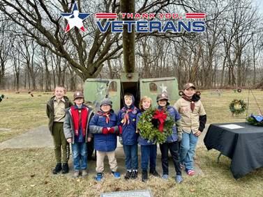 Local volunteers working to honor  veterans at Joliet’s Woodlawn Cemetery with Christmas wreaths