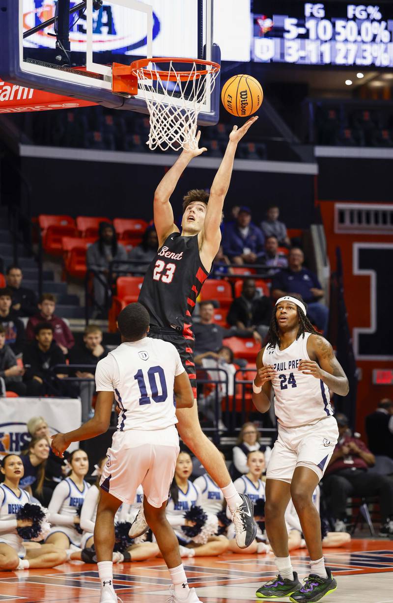 Benet’s Edvardas Stasys (23) puts in a shot during the IHSA Class 4A boys basketball state semifinal Friday, March 13, 2026 at the State Farm Center in Champaign.