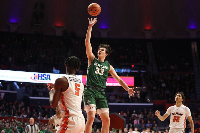 Glenbard West’s Bobby Durkin floats a shot against Whitney Young in the Class 4A championship game at State Farm Center in Champaign. Saturday, Mar. 12, 2022, in Champaign.