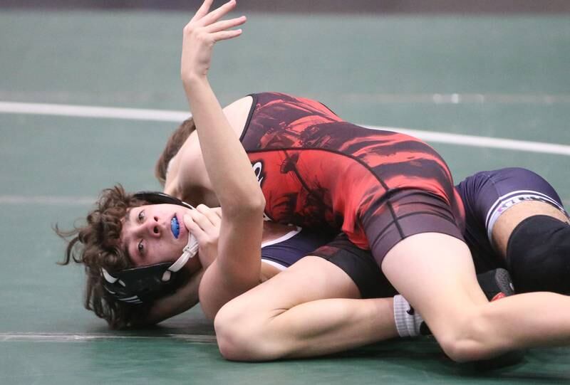 Amboy's Aden Spinelli wrestles Lisle's Sebastian Lara in the 106 pound weight class during the Class 1A Regional meet on Saturday, Feb. 8, 2025 at St. Bede Academy.