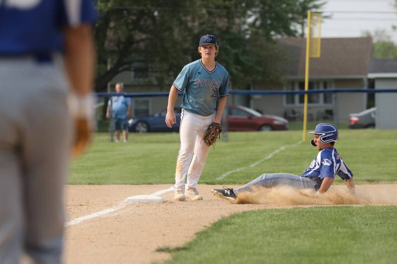 Princeton's Augie Christiansen slides in safely to third base Thursday at Prather Field.