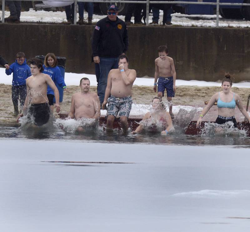 Fourteen teams participated Saturday, Jan. 27, 2024, jumping into an icy pond during the annual Penguin Plunge at Skydive Chicago in Ottawa. The event raised money for the Make-A-Wish Foundation.