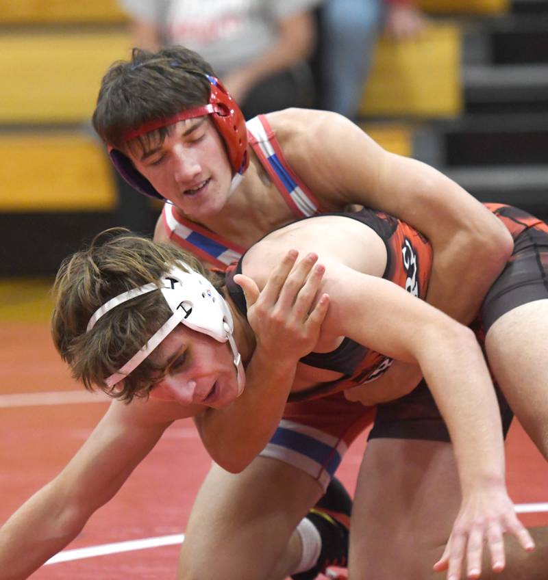 Oregon's Nelson Benesh (top) and Amboy's Keaton Thompson wrestle at 138 pounds at Oregon High School on Tuesday, Nov. 25, 2025.
