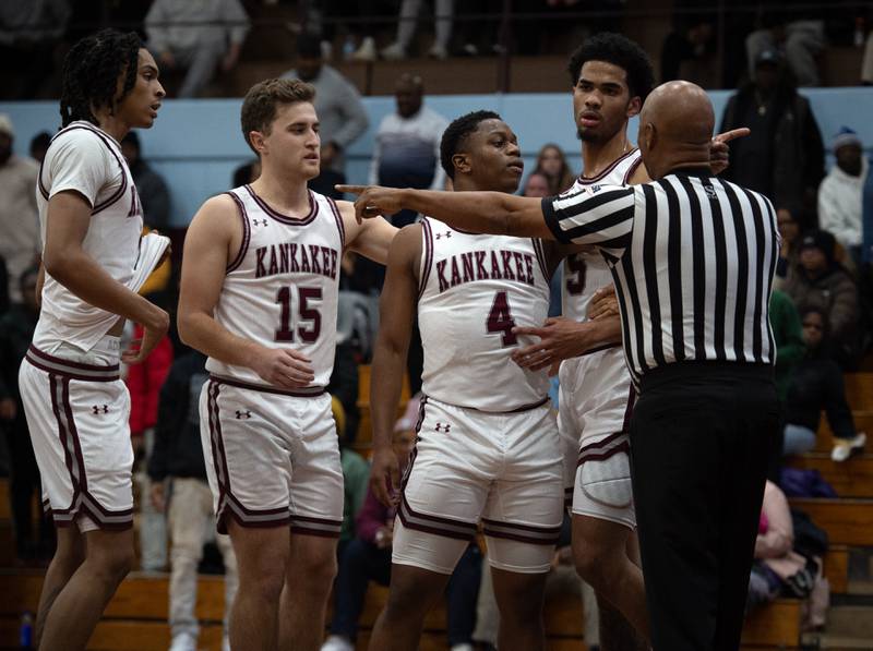 Kankakee's Myair Thompson, center, points to a Thornton player after an intentional foul on Lincoln Williams, far left, in a game on Friday, December 12, 2025.