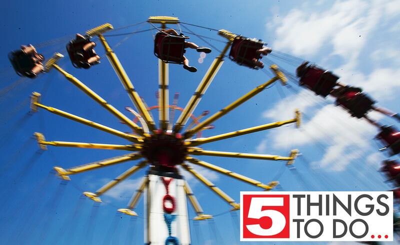 People ride the swings at the carnival Sunday, Sept. 1, 2013, the last day of the Summer Sunset Festival in Lake in the Hills.