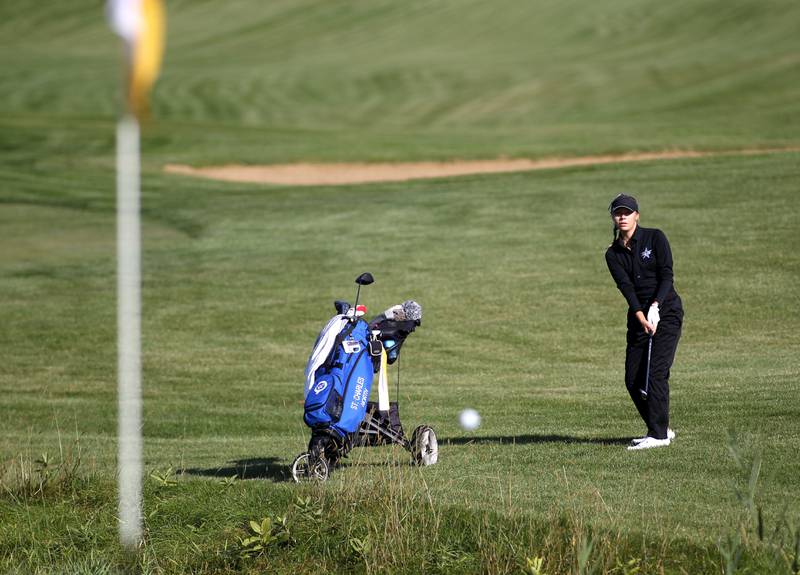 St. Charles North’s Caitlin Scanlon hits onto the green during the Class 2A South Elgin Regional at the Highlands of Elgin on Thursday, Sept. 29, 2022.