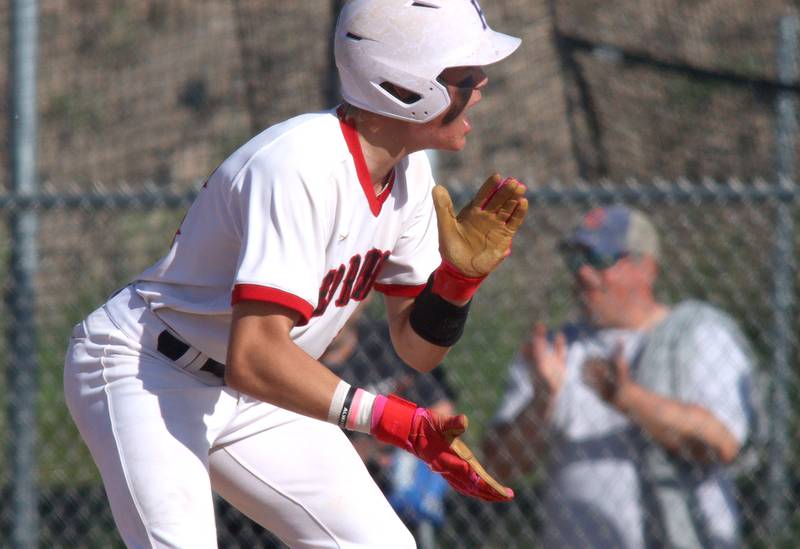 Huntley’s Kyle Larson gets revved up as the Red Raiders strike early against Barrington in sectional semifinal baseball action at Hampshire Wednesday.