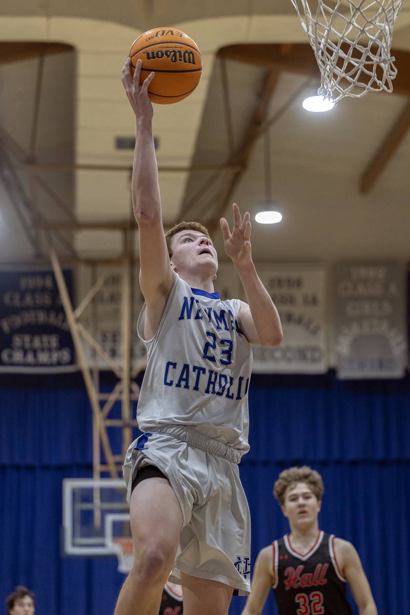 Newman's John Rozwee puts in a shot against Hall Friday, Jan. 17, 2025 at Newman High School.
