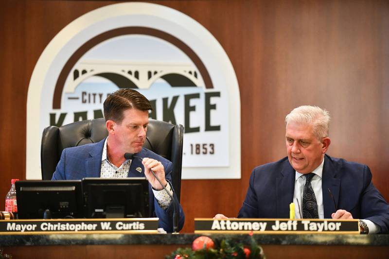 Kankakee Mayor Chris Curtis, left, and city attorney Jeff Taylor participate in the Kankakee Electoral Board hearings Thursday.