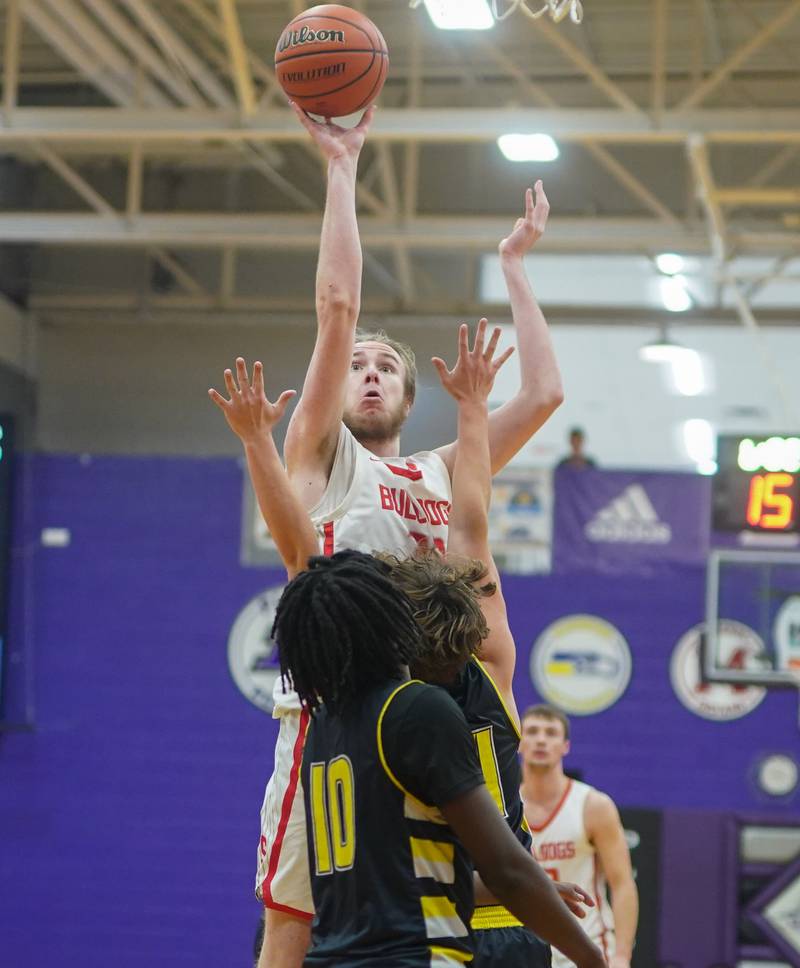 Streator's Quinn Baker (33) shoots the ball in the post against Yorkville Christian's Sam Painter (14) and Jayden Riley (10) during the 60th annual Plano Christmas Basketball Tournament Plano High School in December 2023.