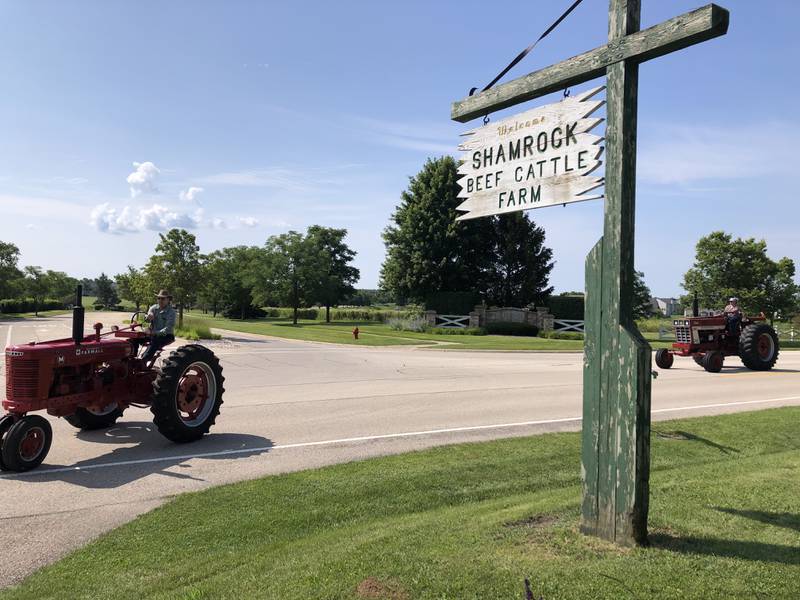 Tractors pull into Shamrock Farm in McHenry during the McHenry County tractor trek July 20, 2024.