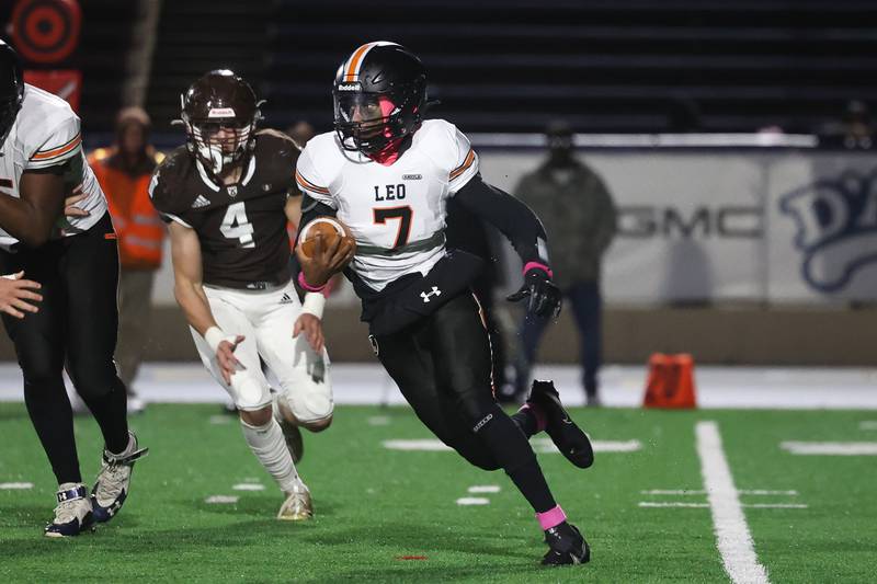 Leo’s Marshawn Durr runs to the outside against Joliet Catholic on Friday, Oct. 6, 2023 in Joliet.