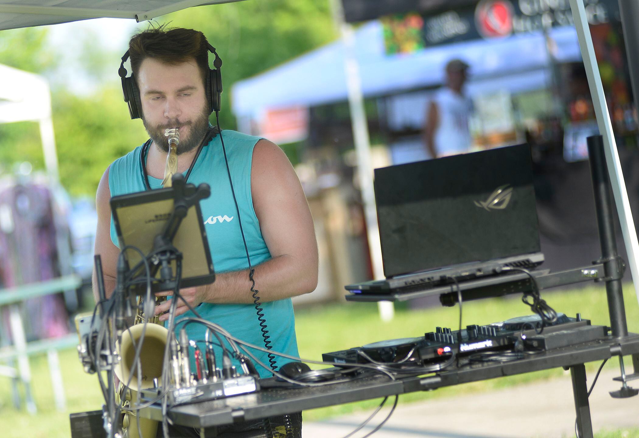 Lucas Sanor provided the soothing saxophone sounds Friday, June 2, 2023, during opening night of the 2 Rivers Wine Fest in Ottawa.