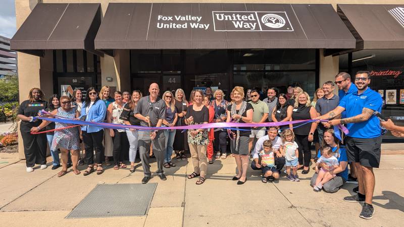 Fox Valley United Way celebrates a ribbon cutting ceremony for their 'Dolly Parton Imagination Library' on July 30 in Aurora.