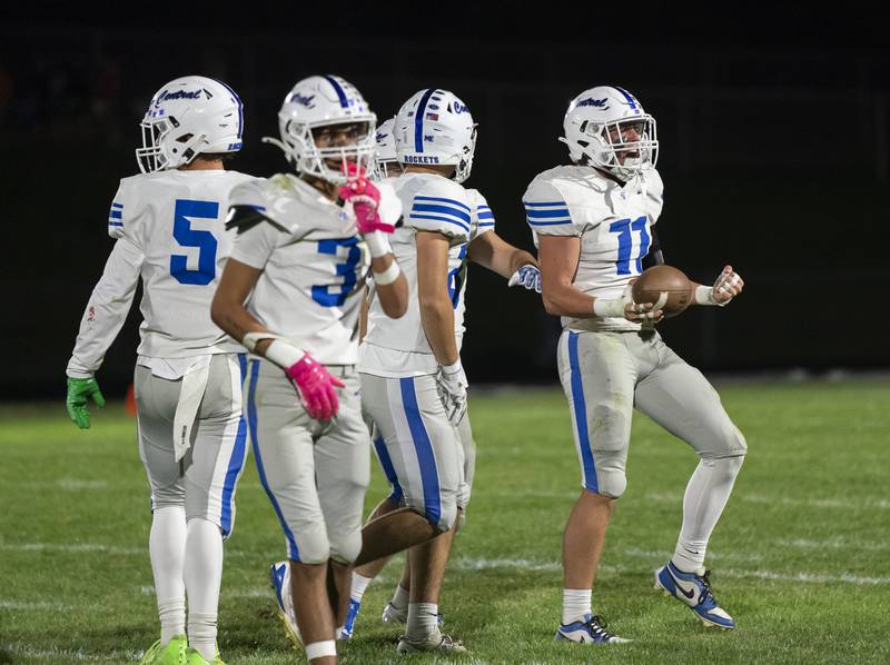 Burlington Central's Mckade Naus, right, celebrates after a turnover during their Fox Valley Conference game against Prairie Ridge on Friday, October 11, 2024 at Prairie Ridge High School in Crystal Lake. Ryan Rayburn for Shaw Local