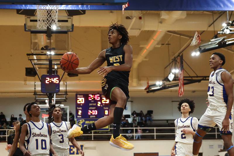 Joliet West’s Aamir Shannon finesses a shot against Joliet Central on Saturday, Jan. 27th, 2024 in Joliet.