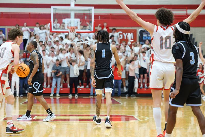 Kankakee's Lincoln Williams (1) walks away as Morton celebrates in the final seconds of the game during the Kays' 61-48 loss to Morton in the IHSA Class 3A Ottawa Sectional championship on Friday, March 6, 2026.