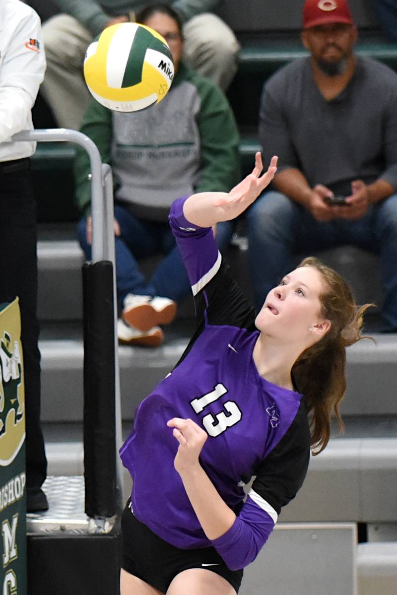 Manteno's Olivia McElroy sends a ball over the net during a game at Bishop McNamara Monday, Oct. 20, 2025.