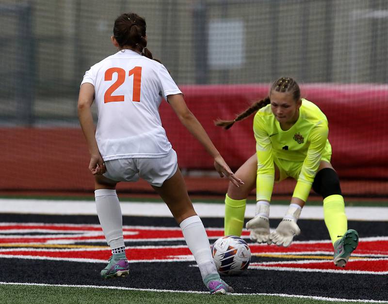 Crystal Lake Central's Ryleigh Smith grabs the ball during the IHSA Class 2A Deerfield Sectional championship girls soccer match against St. Viator' on Friday, May 30, 2025, at Deerfield High School.